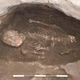 The skeletal remains of a male individual between 35 and 50 years old, and with a cinnabar painting on the skull.